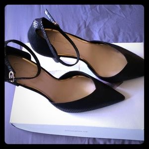 Black snake skin skinny heel.